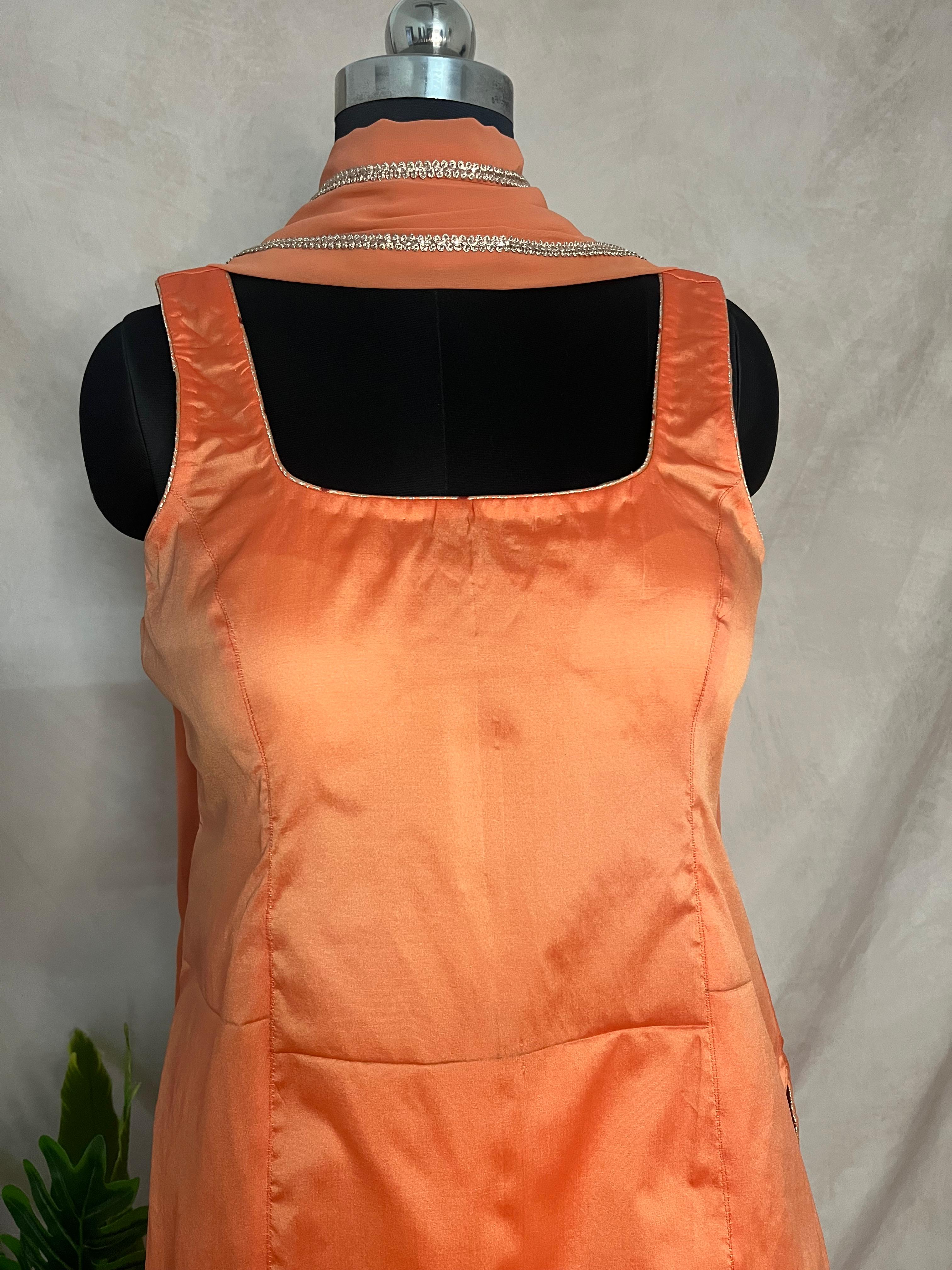 Orange silk top with banarsi bottom