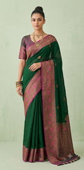Bottle green dupion silk saree with meenakari weave and stitched blouse