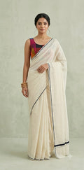 Puliyilakkara saree with olive green border