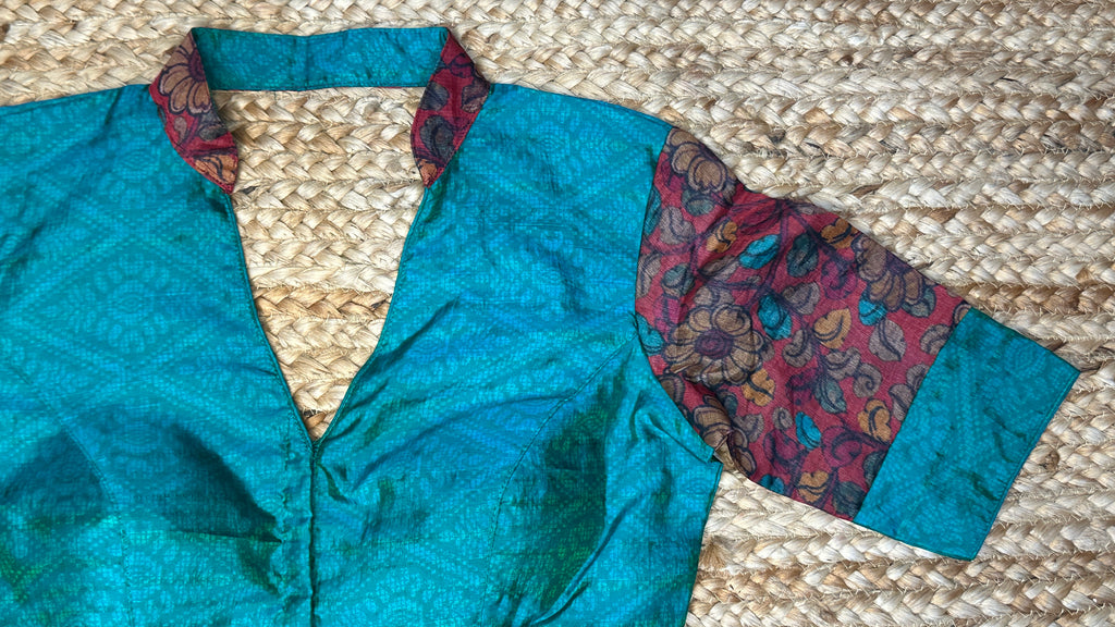 Peacock green silk blouse