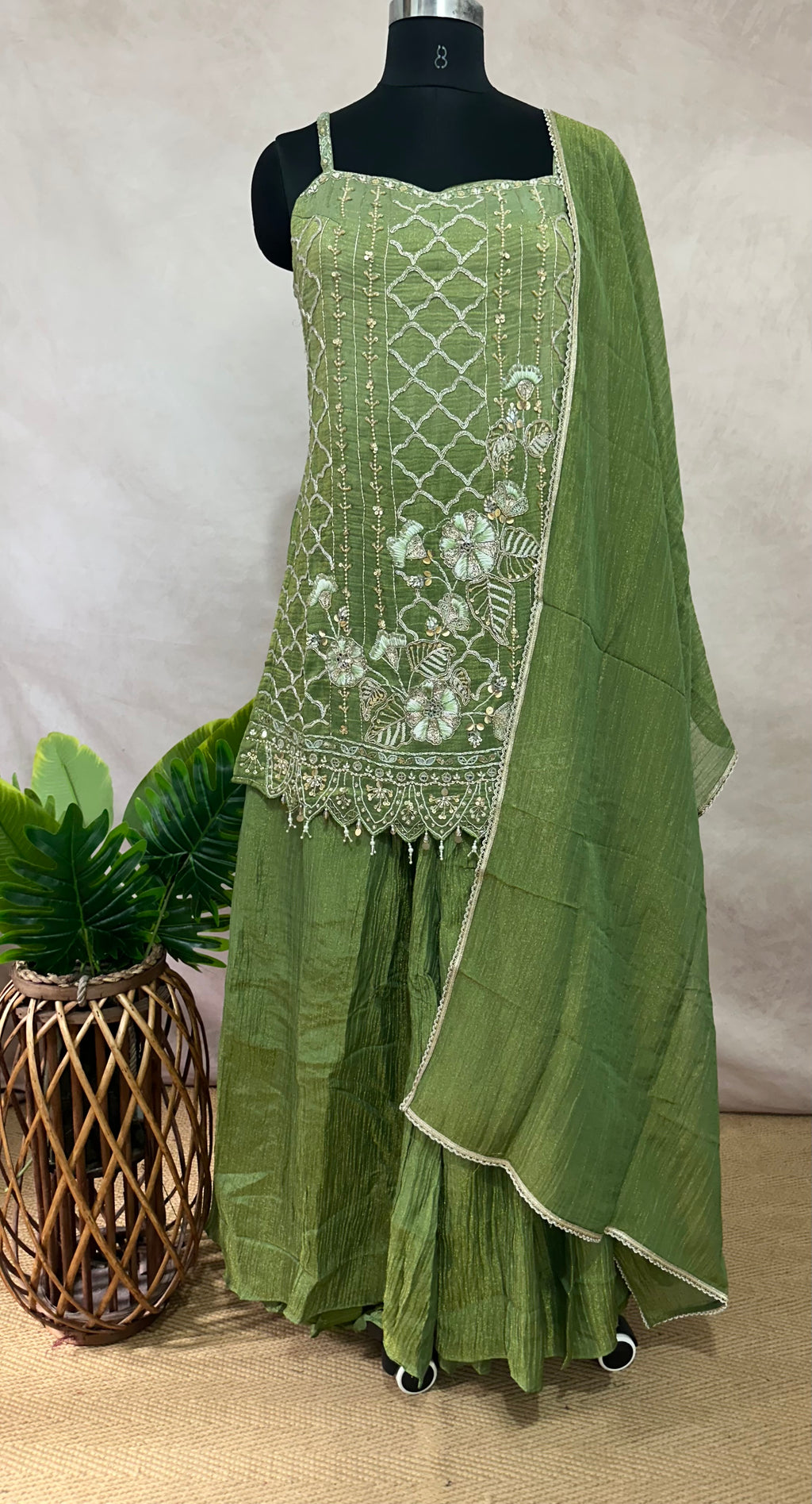 Light green deisgner short top with flared bottom