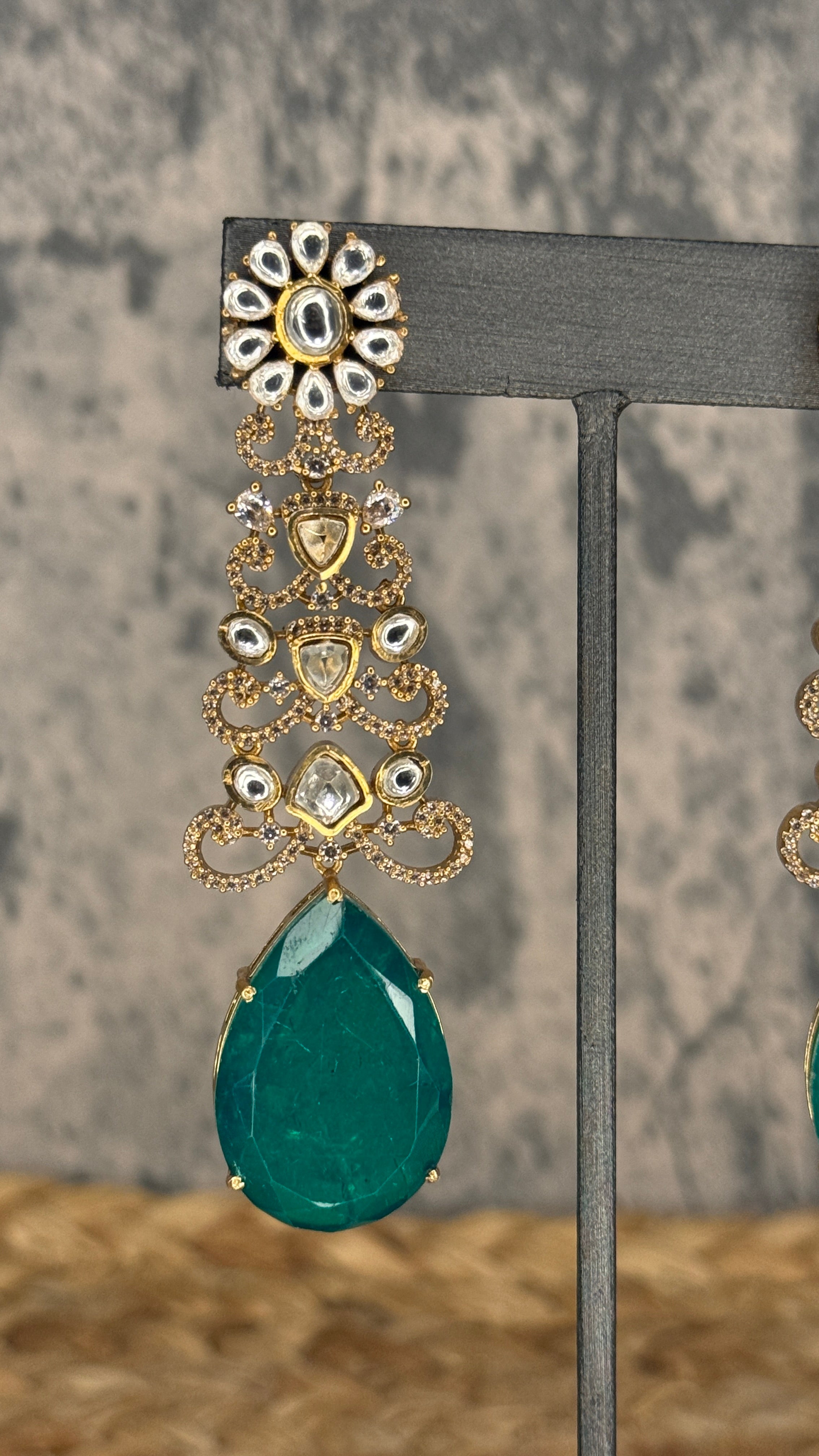 Designer replica earring with green and moissanite stone
