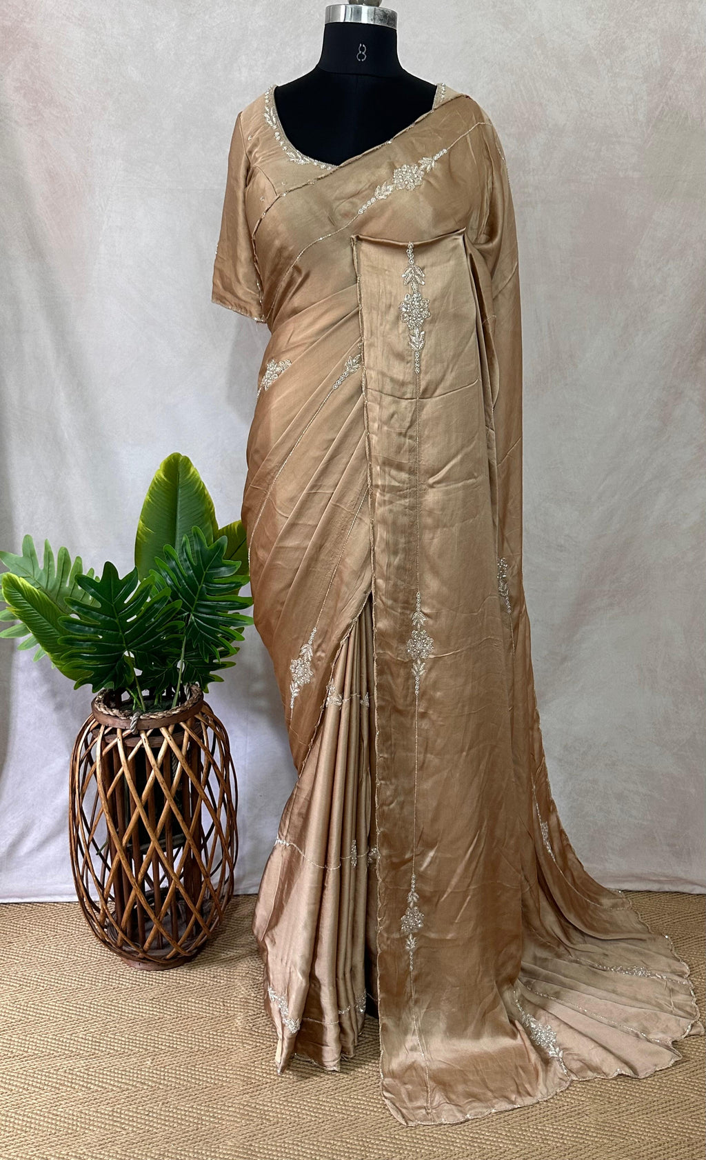 Modal silk saree with hand embroidery and stitched blouse