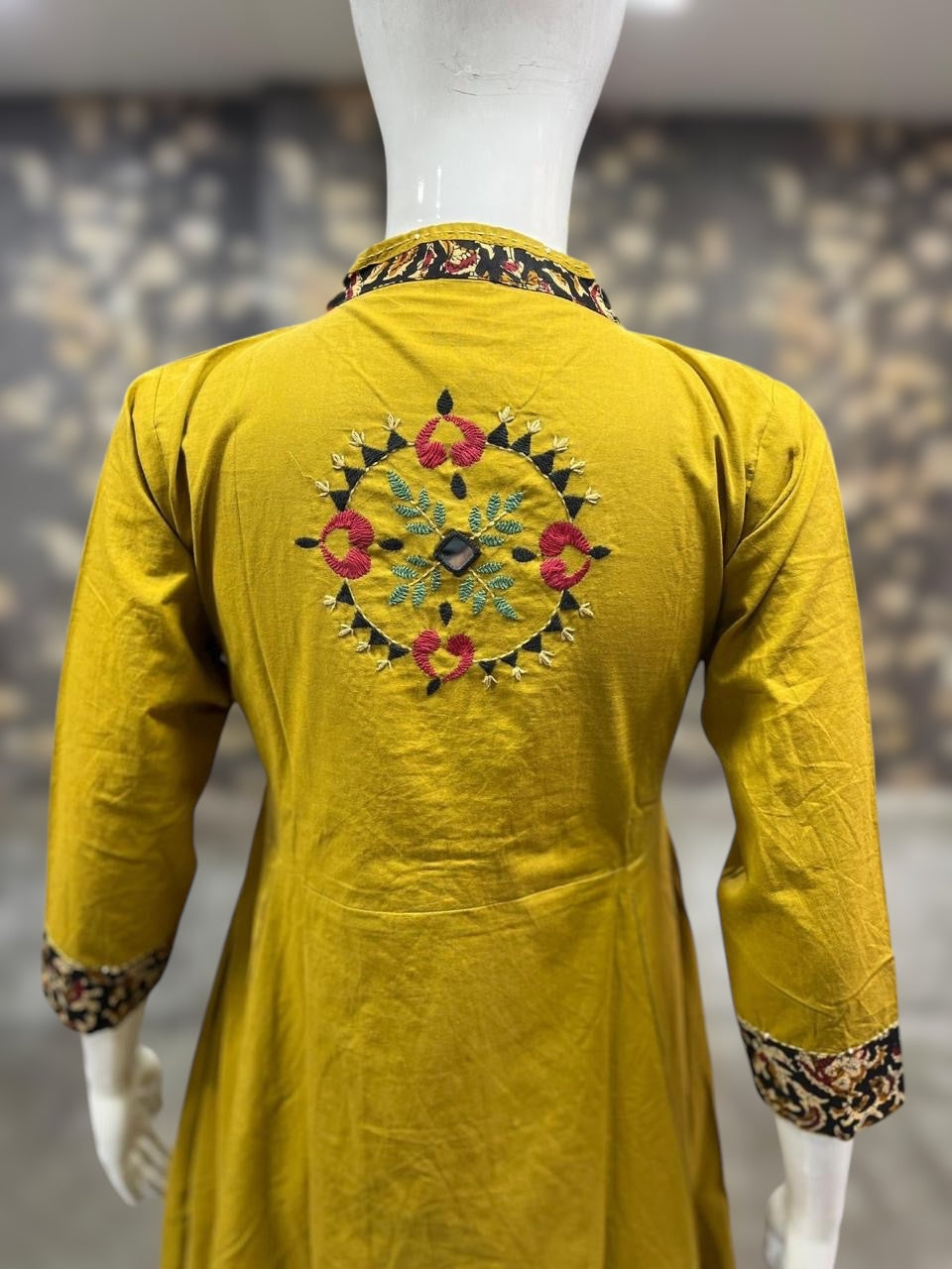 Mustard yellow cotton kurti with handwork on back neck, includes bottoms