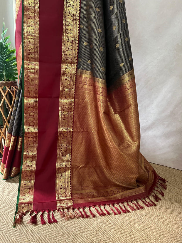 Navy blue and maroon Kanchivaram saree with stitched blouse