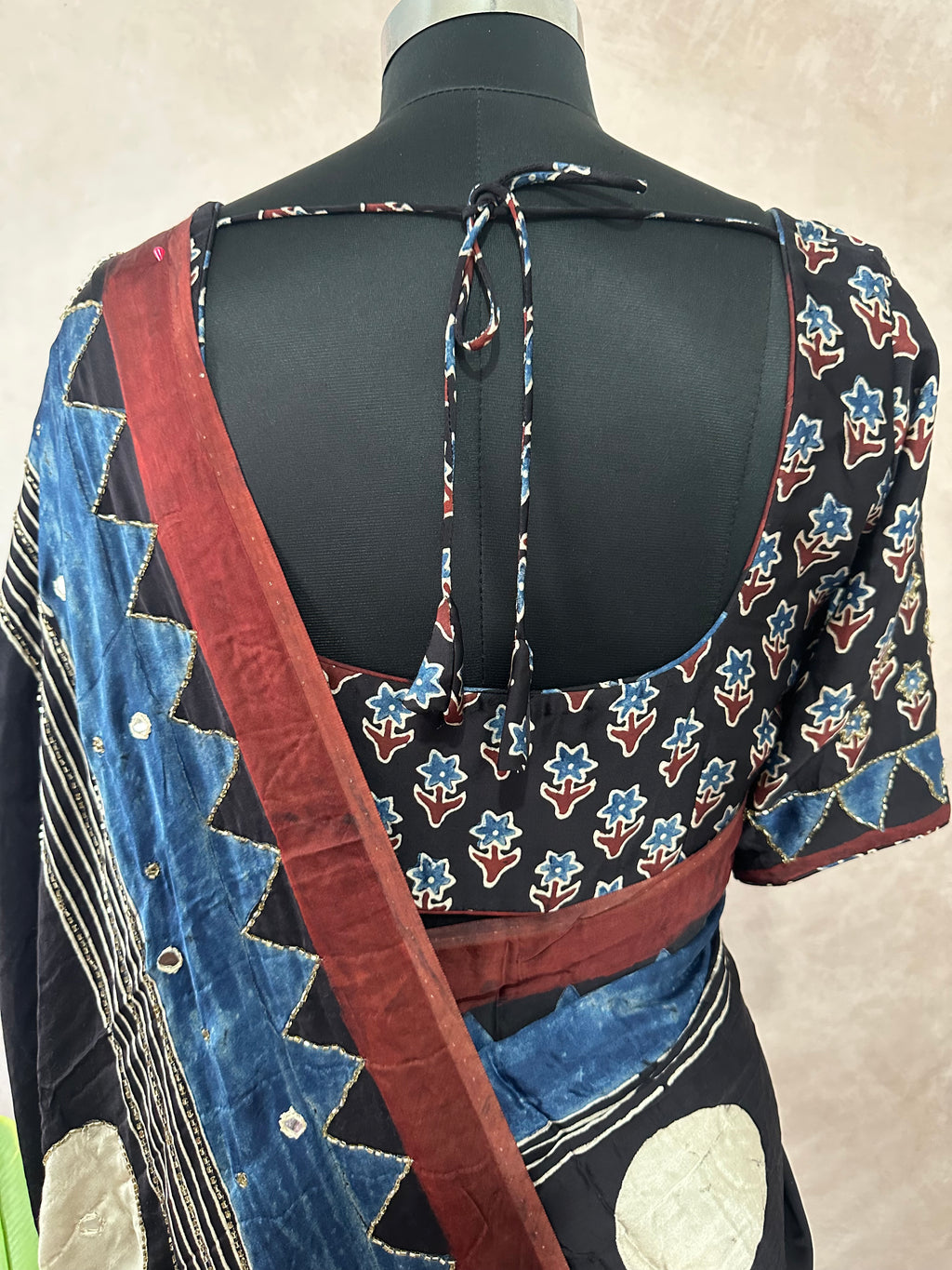 Modal silk saree with bead and mirror work , stitched blouse