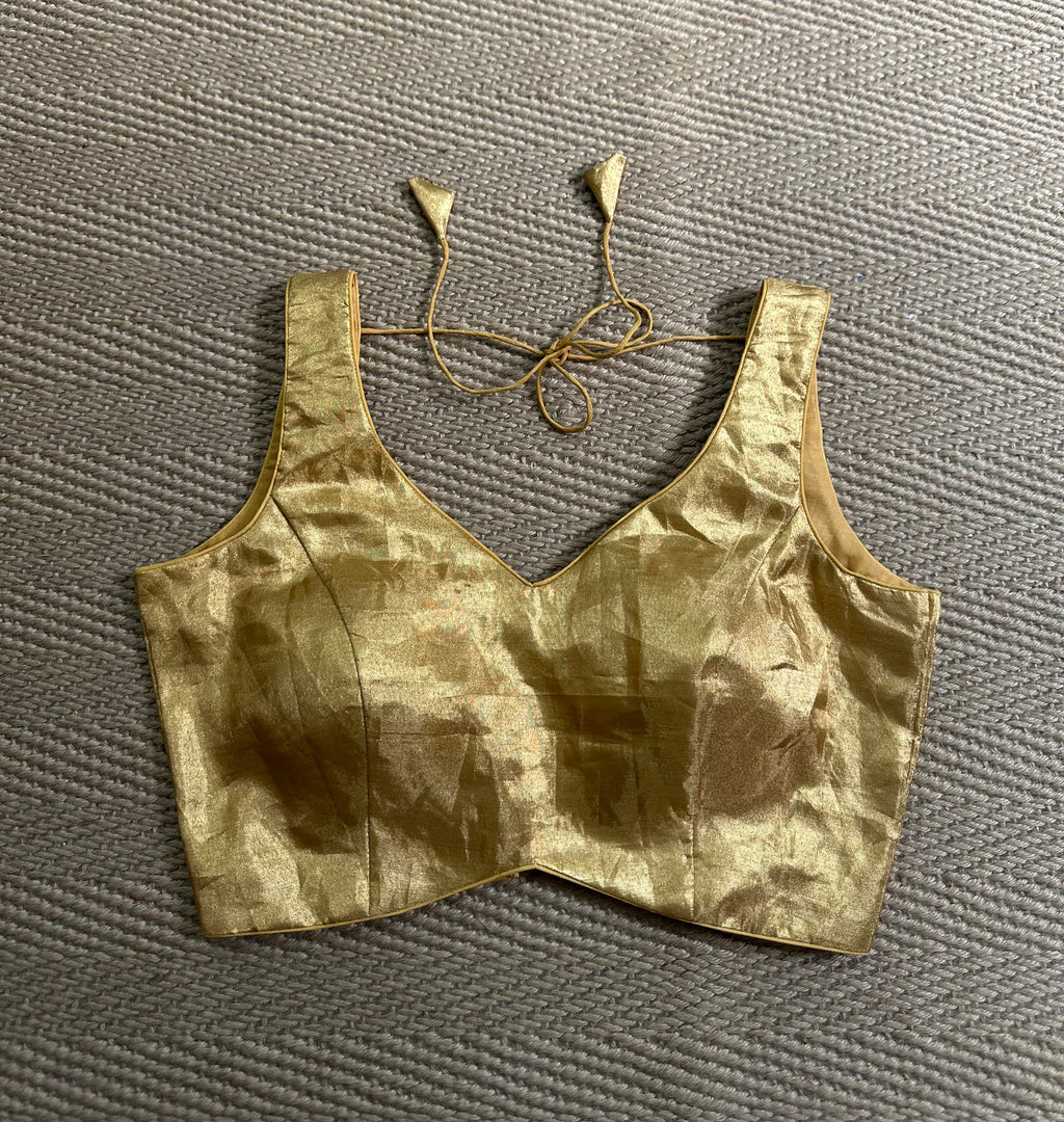 Gold tissue sleeveless blouse