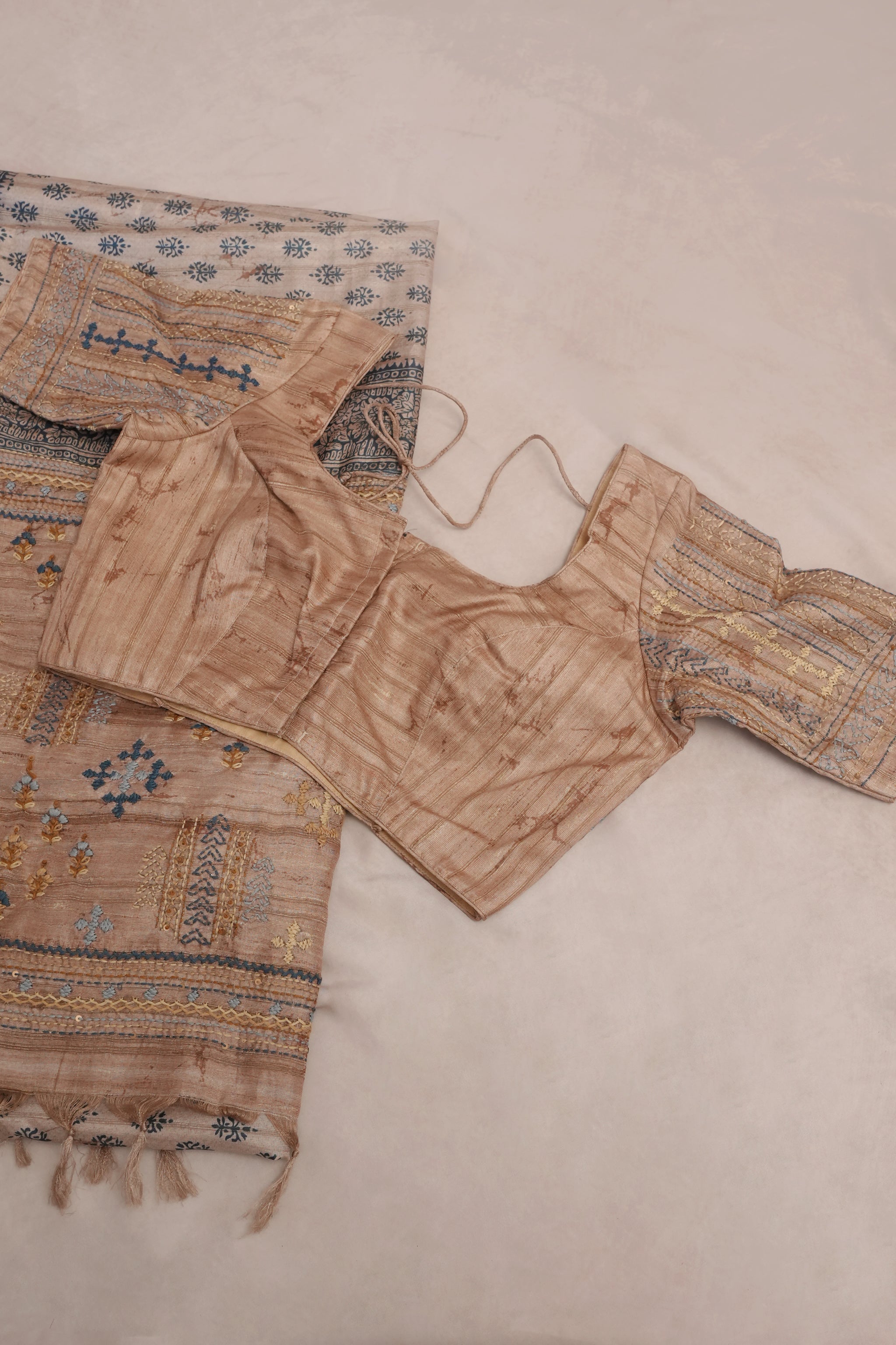 Printed Tussar silk saree with hand embroidery and stitched blouse