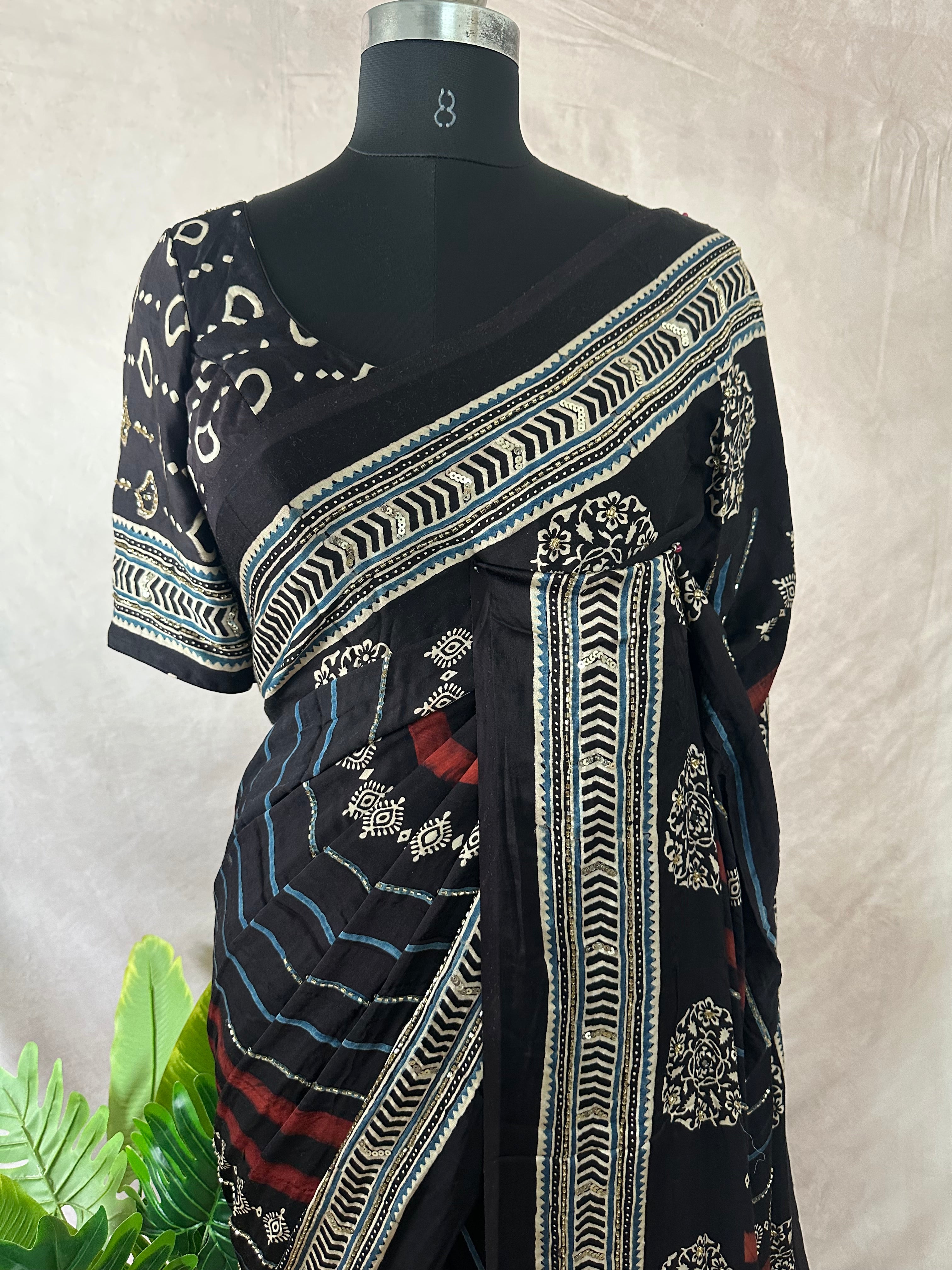 Modal silk saree with bead and mirror work , stitched blouse