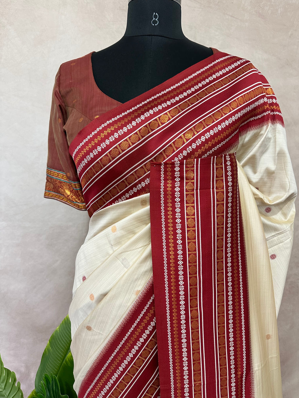 Asam silk saree with Red broder and stitched blouse