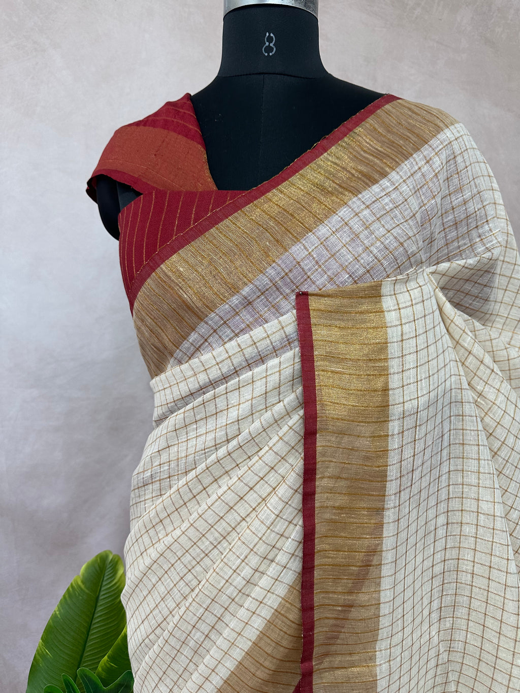 Linen saree with small chck and Maroon border