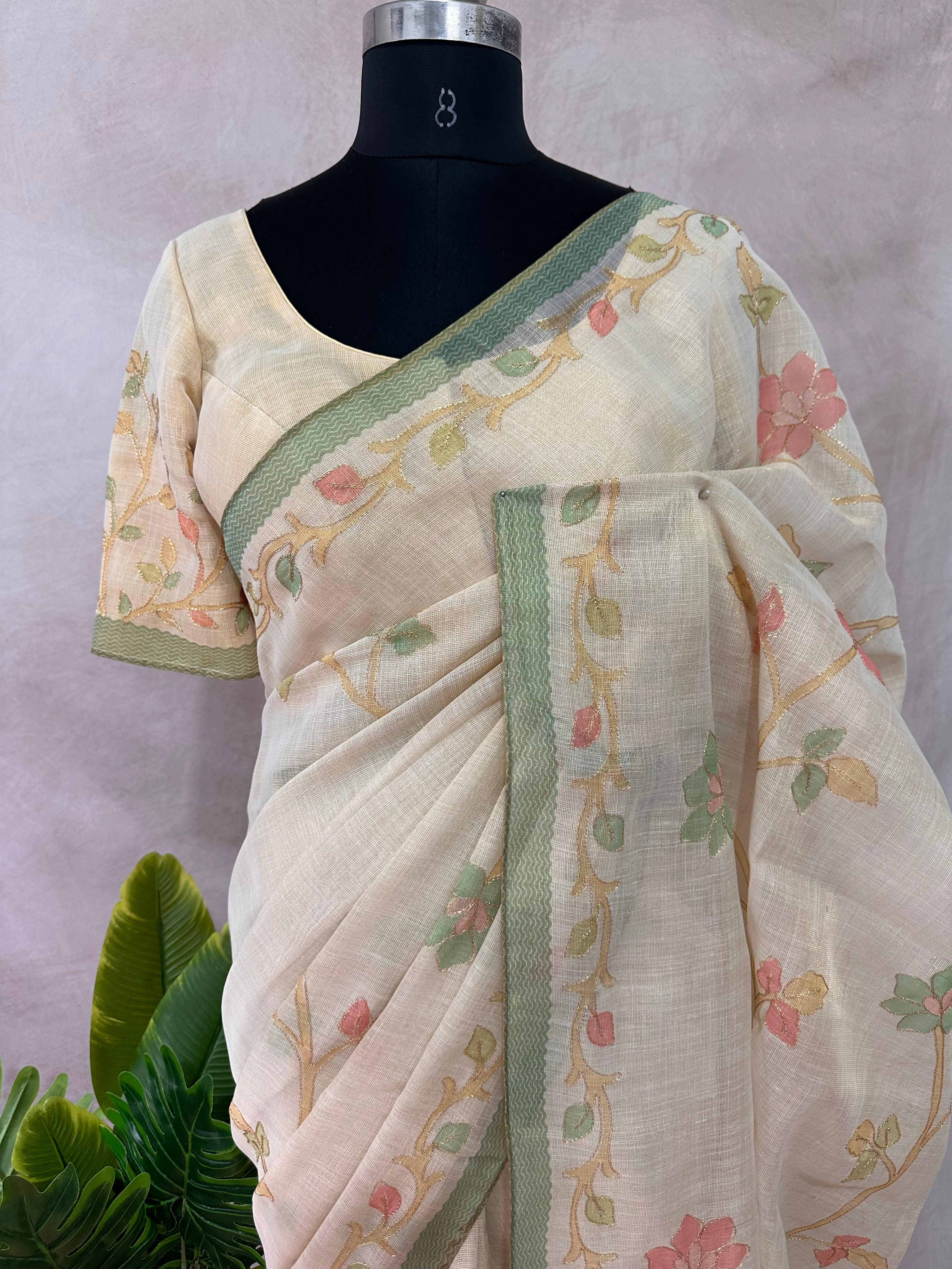 Printed Tissue linen saree with thread work, and stitched blouse