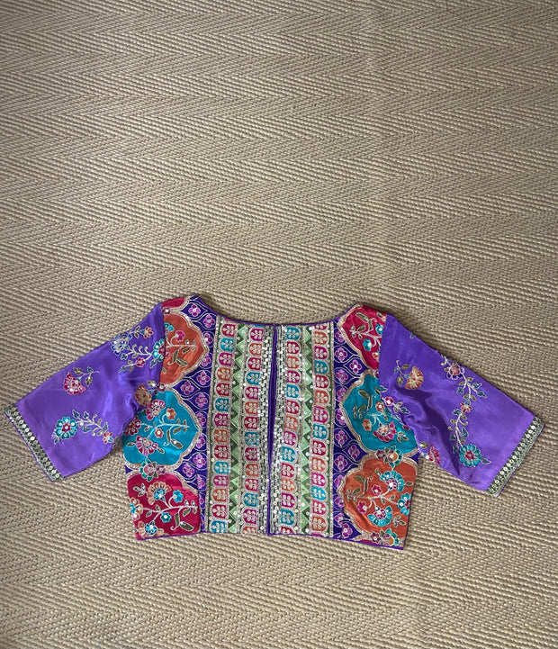 Purple blouse with multi color print and highlighted with threadwork
