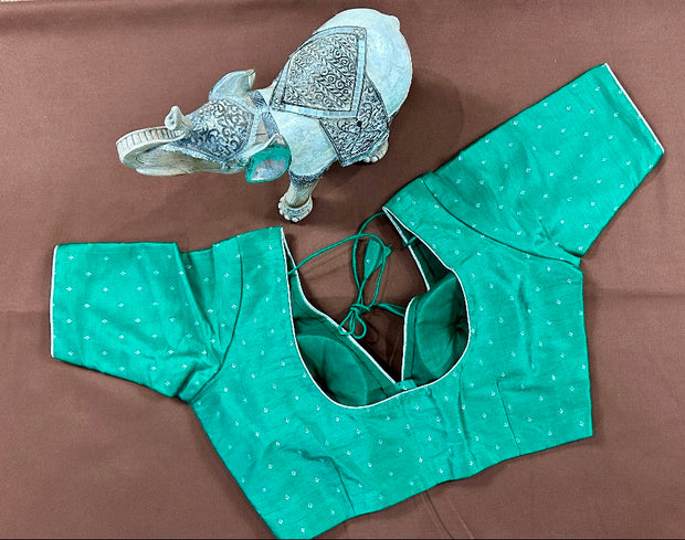 Green silk blouse with gold and silver weave