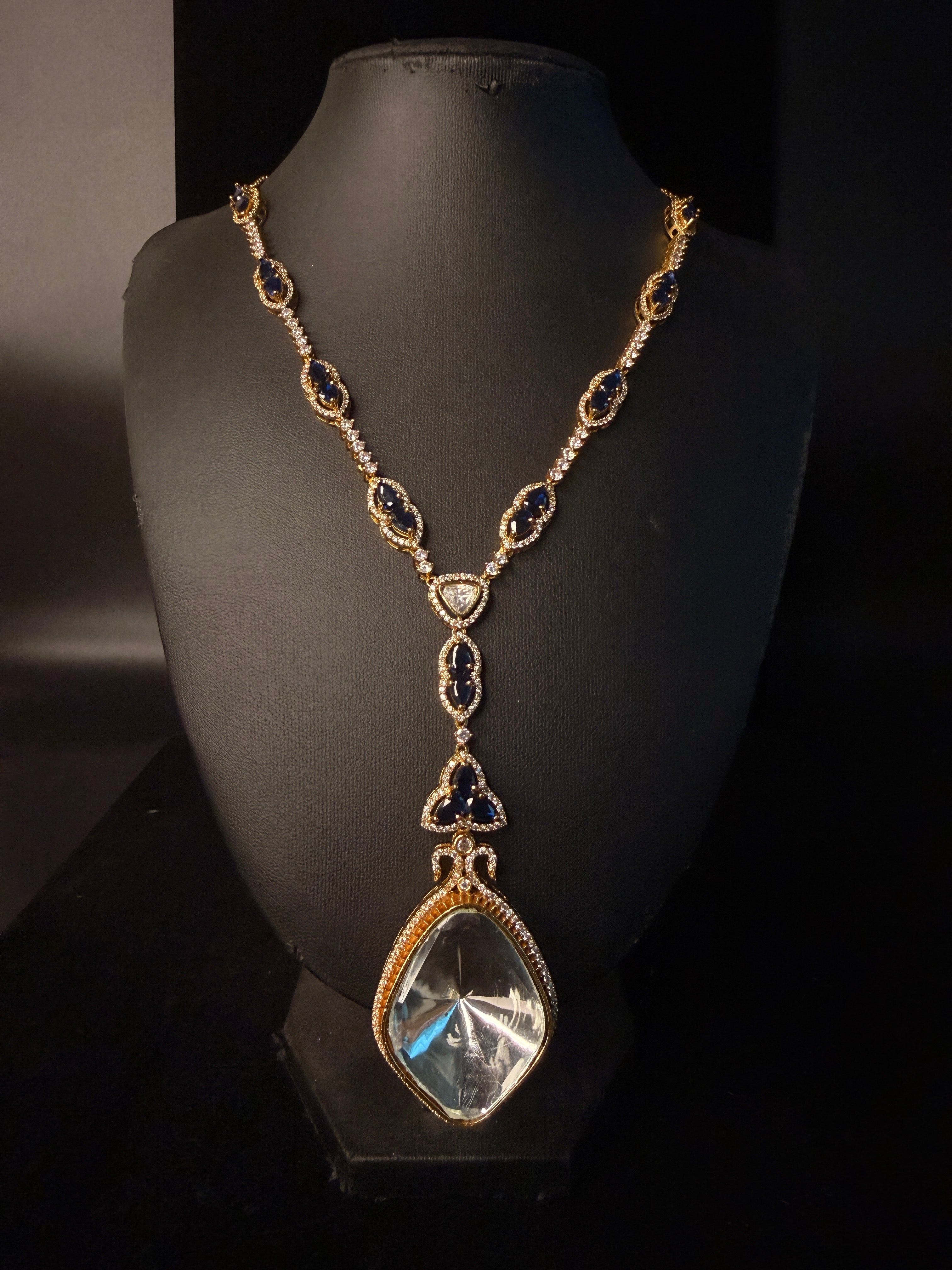 Moissonite necklace with white and blue stone