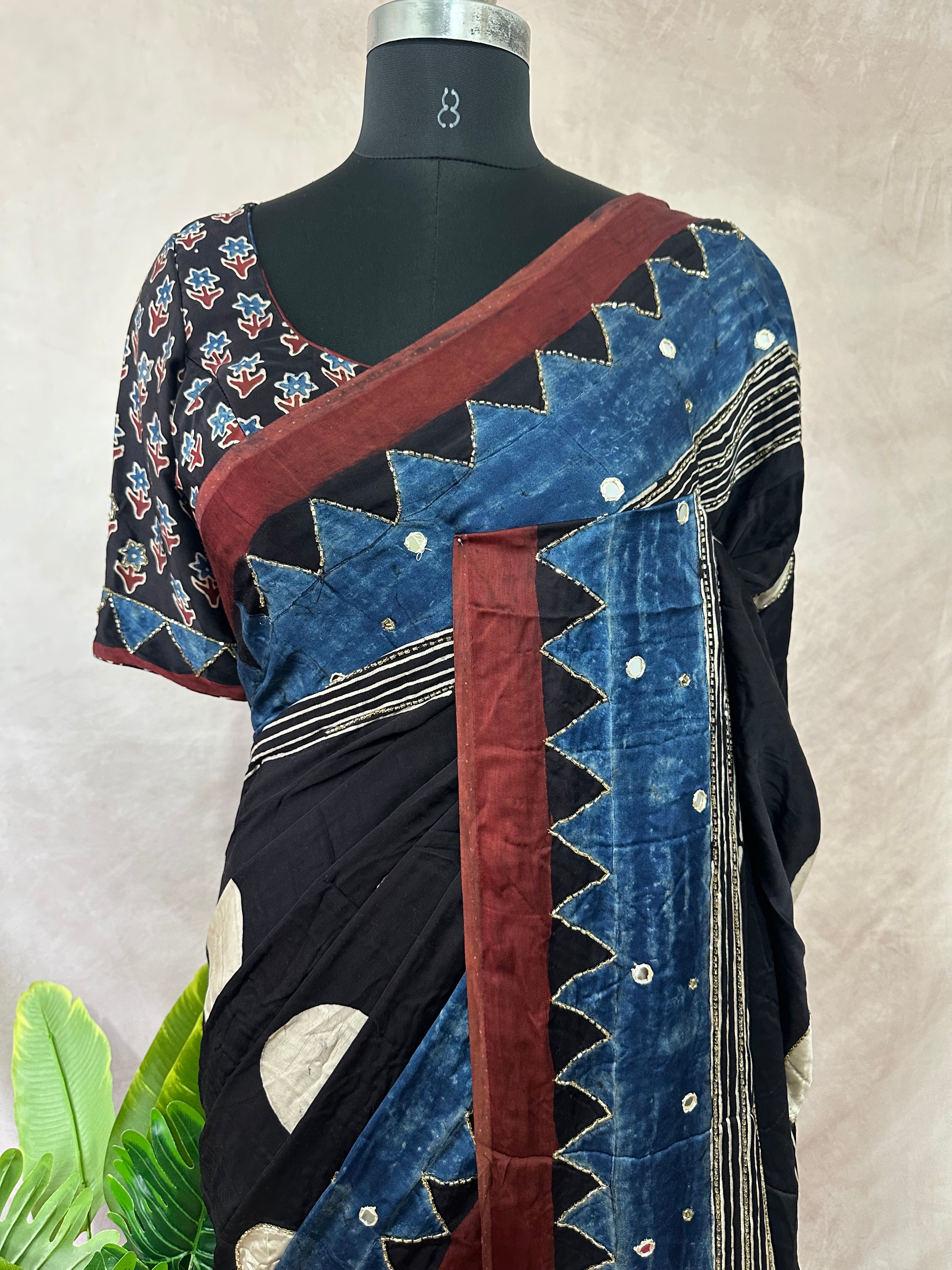 Modal silk saree with bead and mirror work , stitched blouse