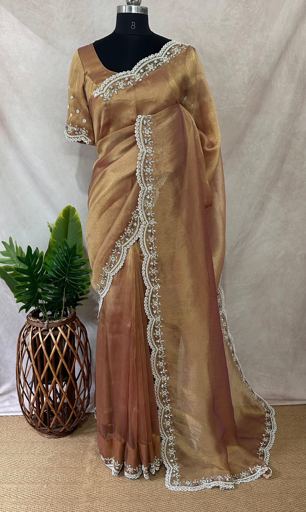 Tissue designer saree with stitched blouse and under skirt