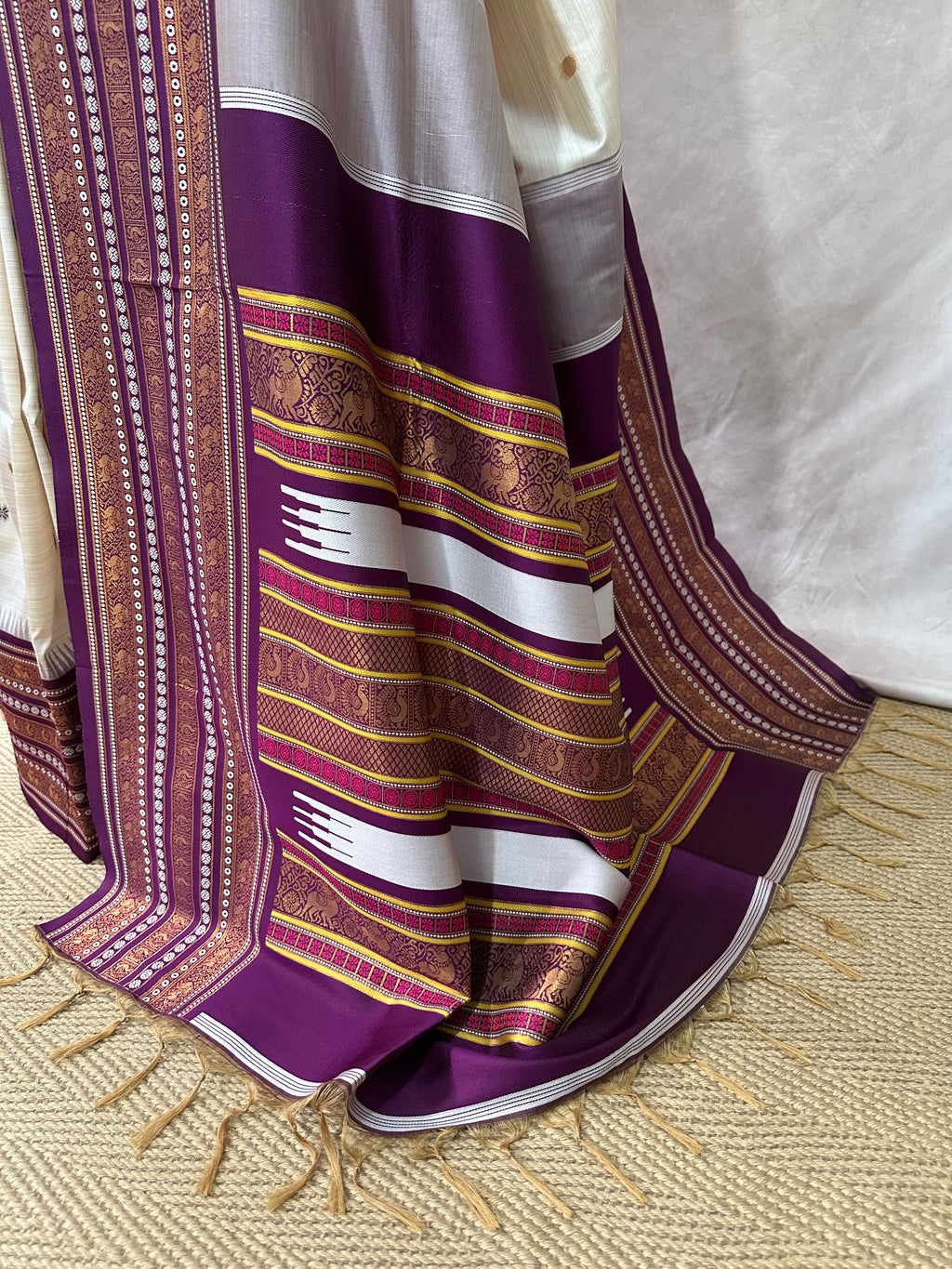 Asam silk saree with Purple broder and stitched blouse