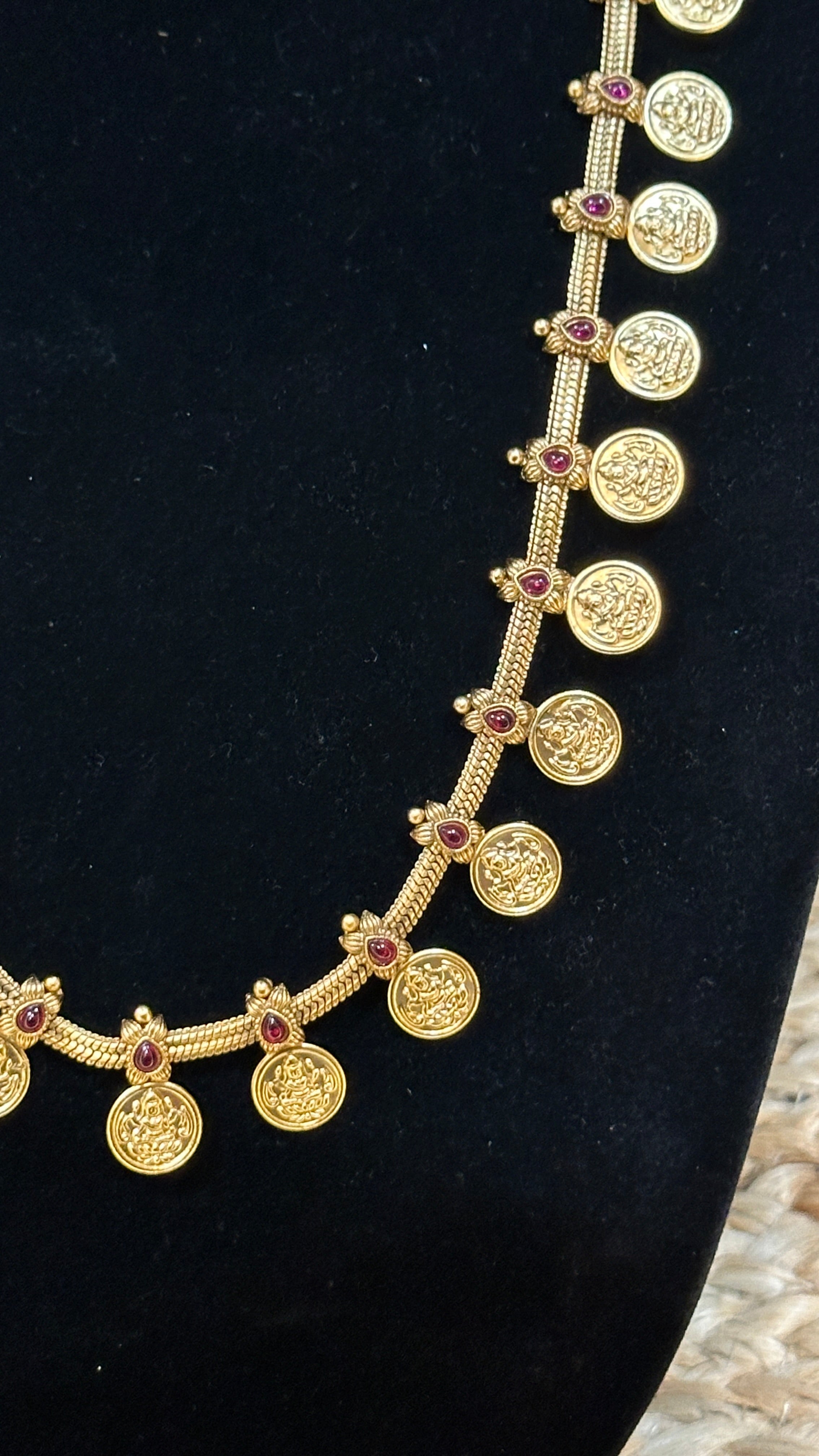 Kasumala with ruby red stone