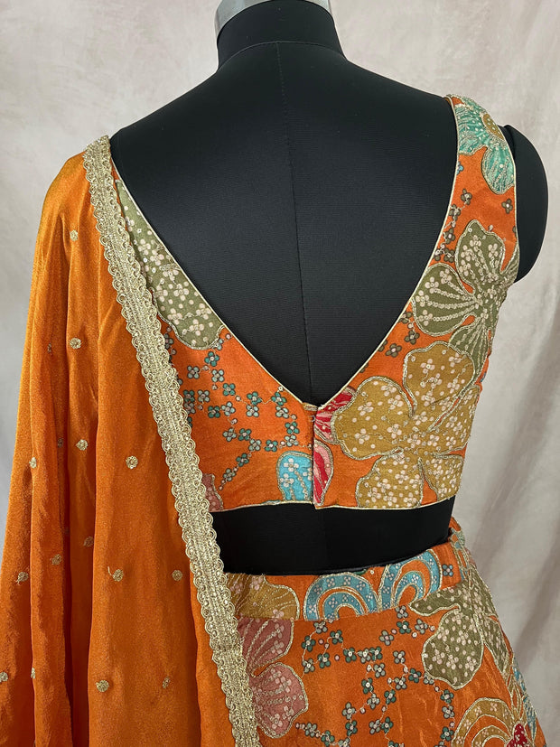 Orange tissue lehanga with work