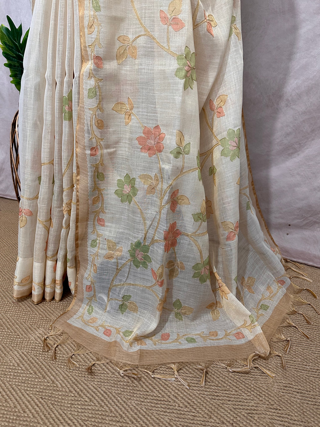 Printed Tissue linen saree with thread work, and stitched blouse