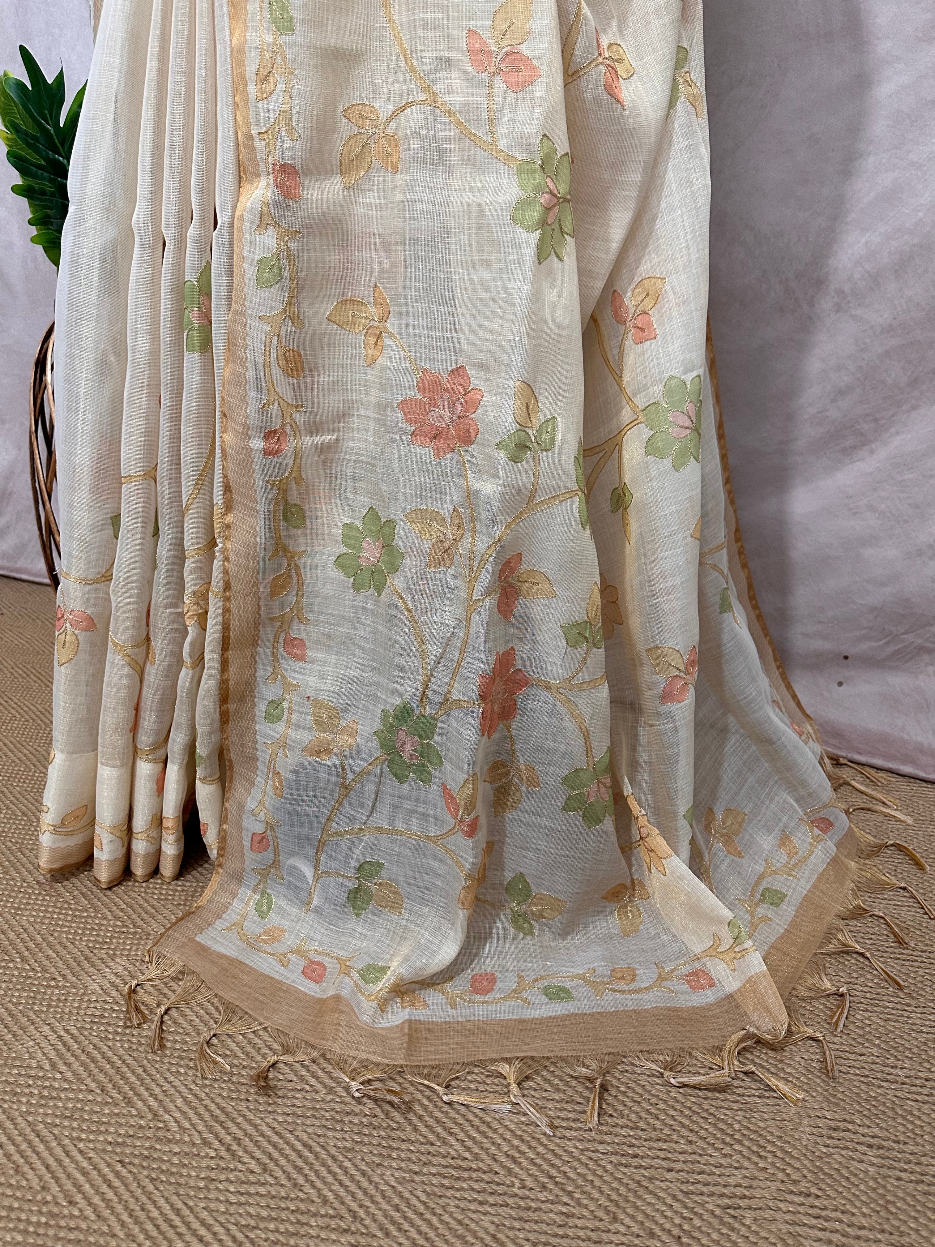 Printed Tissue linen saree with thread work, and stitched blouse