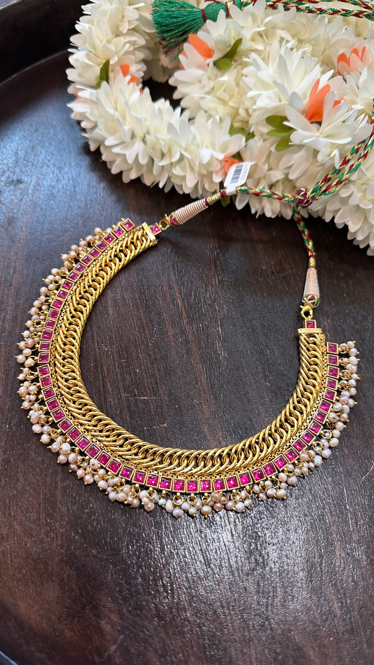 Designer inspired necklace with ruby red kemp stones