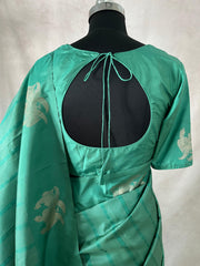 Light peacock Green Kanchivaram saree with stitched blouse