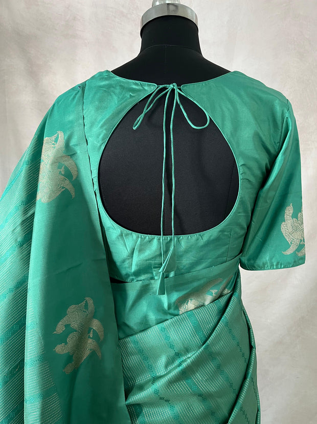 Light peacock Green Kanchivaram saree with stitched blouse