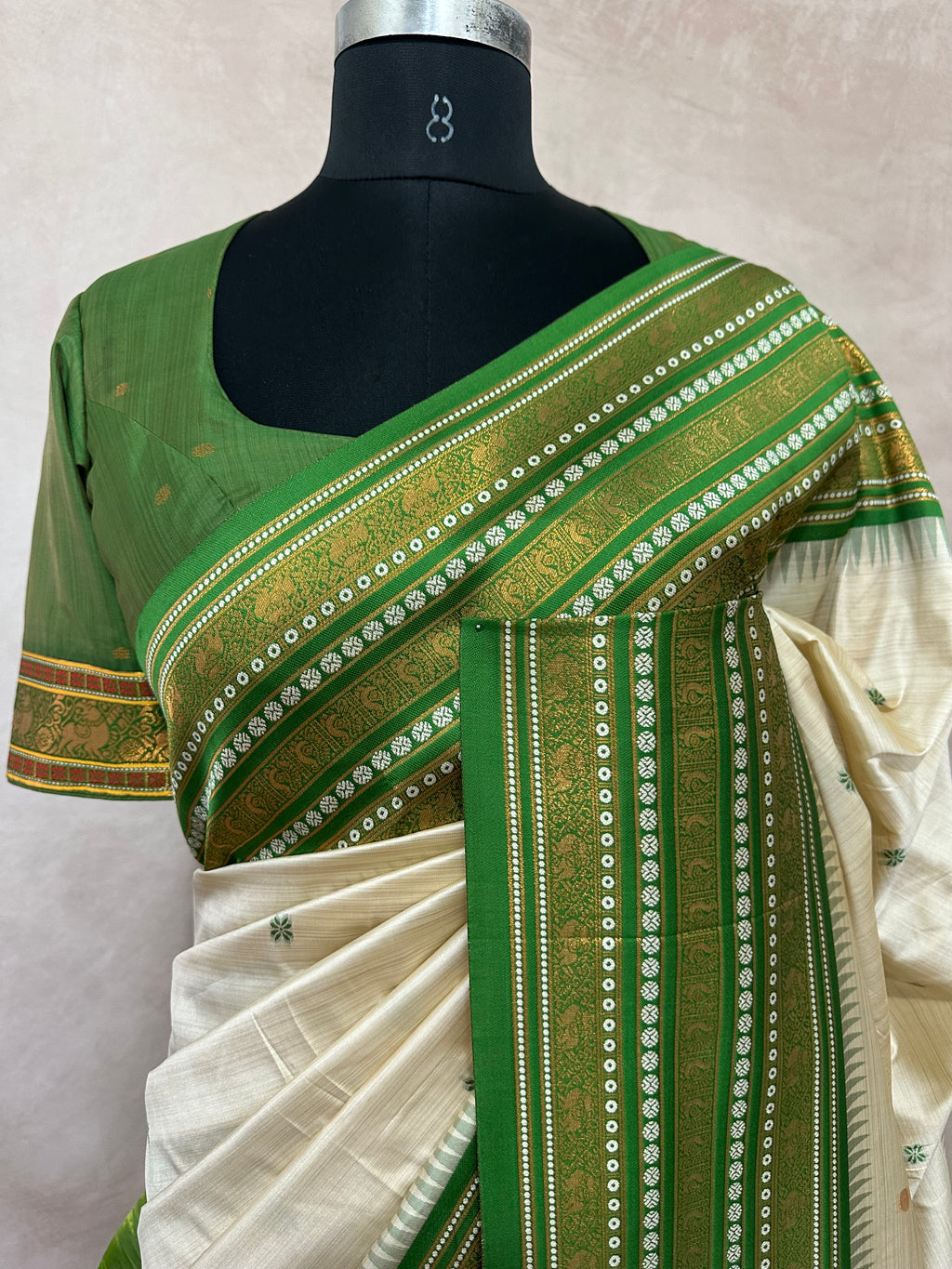 Asam silk saree with green border and stitched blouse