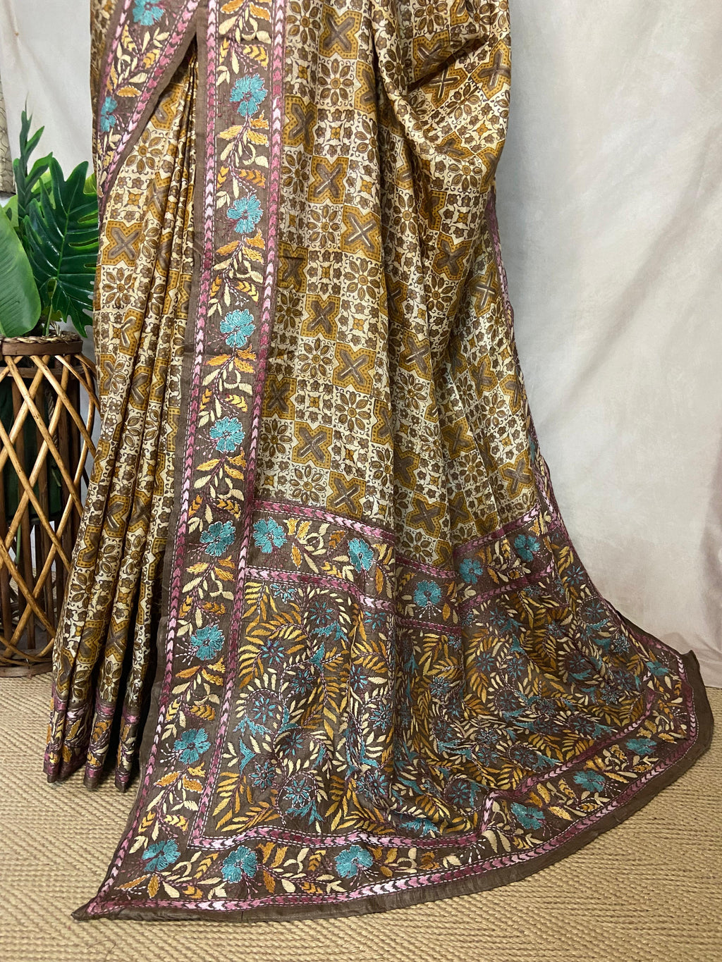 Pure tussar silk saree with Ajrakh hand block print and hand embroidery, stitched blouse