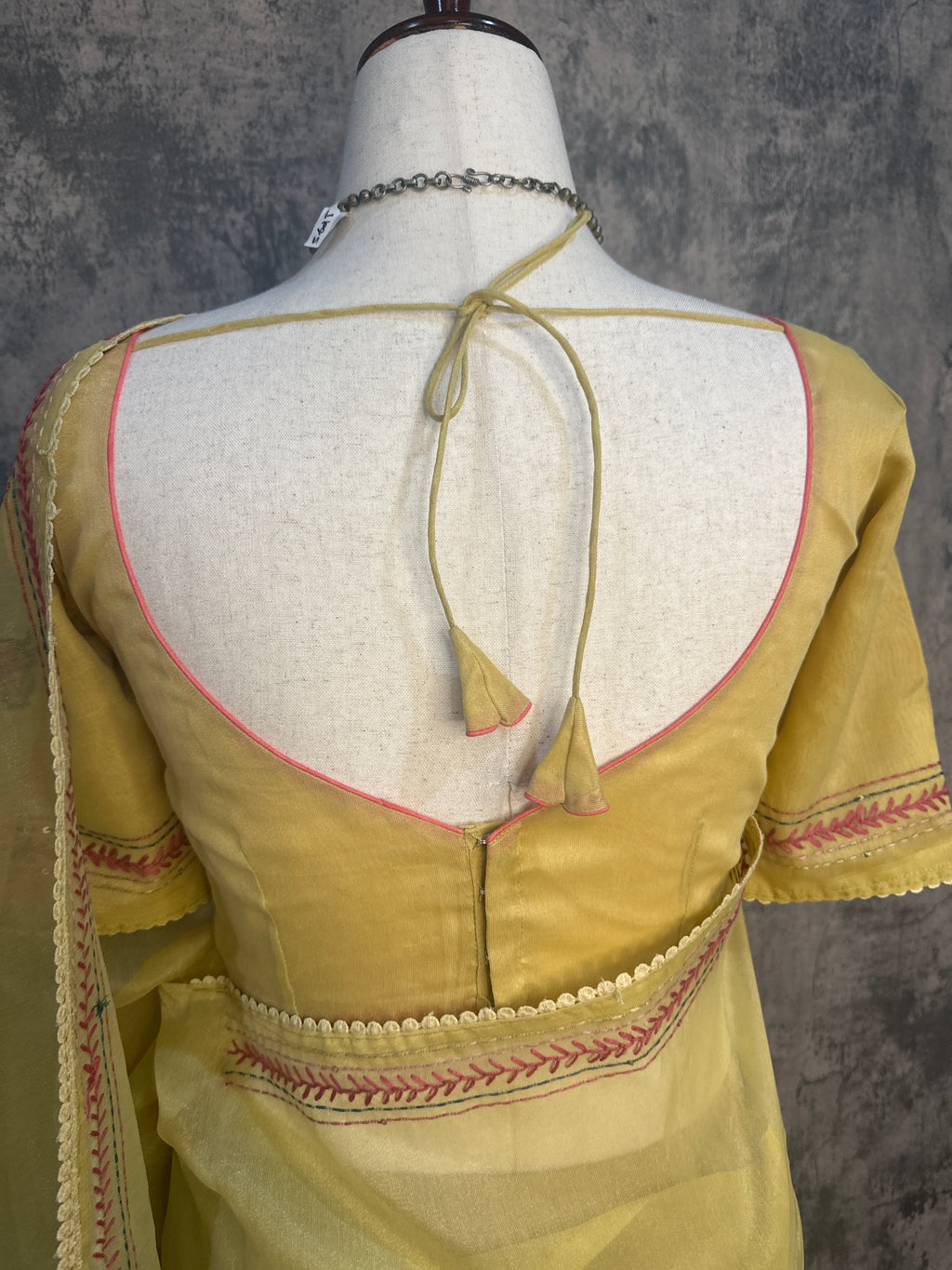 Tissue cotton saree with handwork and stitched blouse