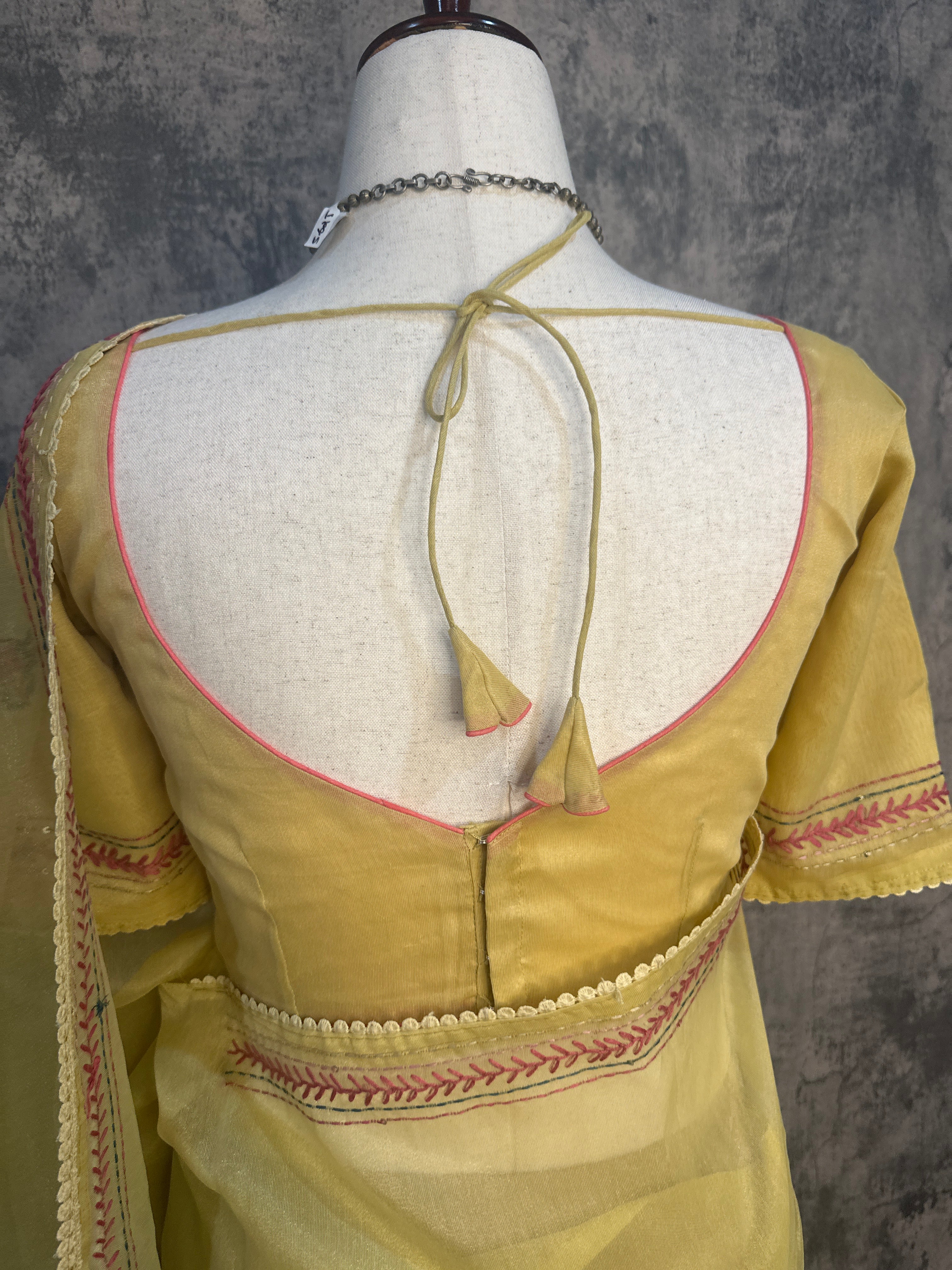 Tissue cotton saree with handwork and stitched blouse
