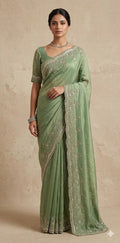 Green tissue designer saree with stitched blouse and under skirt