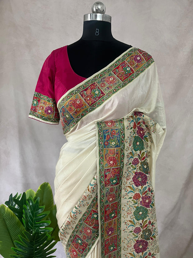 Cream munga silk saree with floral weaved border and bead work, comes with stitched blouse