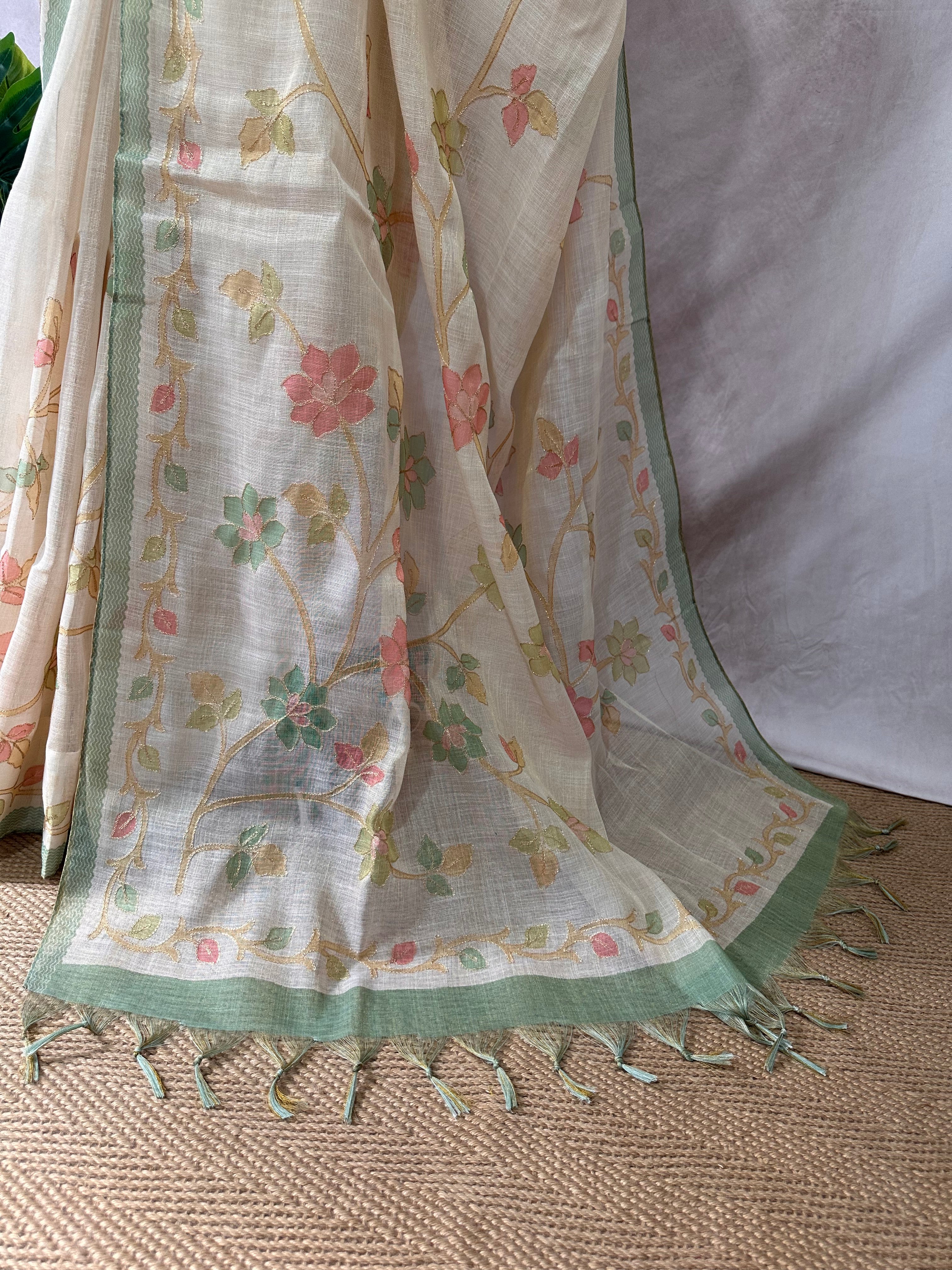 Printed Tissue linen saree with thread work, and stitched blouse