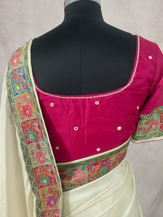 Cream munga silk saree with floral weaved border and bead work, comes with stitched blouse