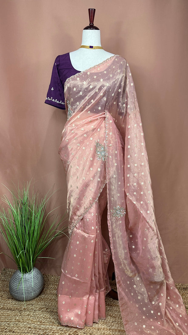 Peach Tissue silk saree with hand emroidery and contract blouse