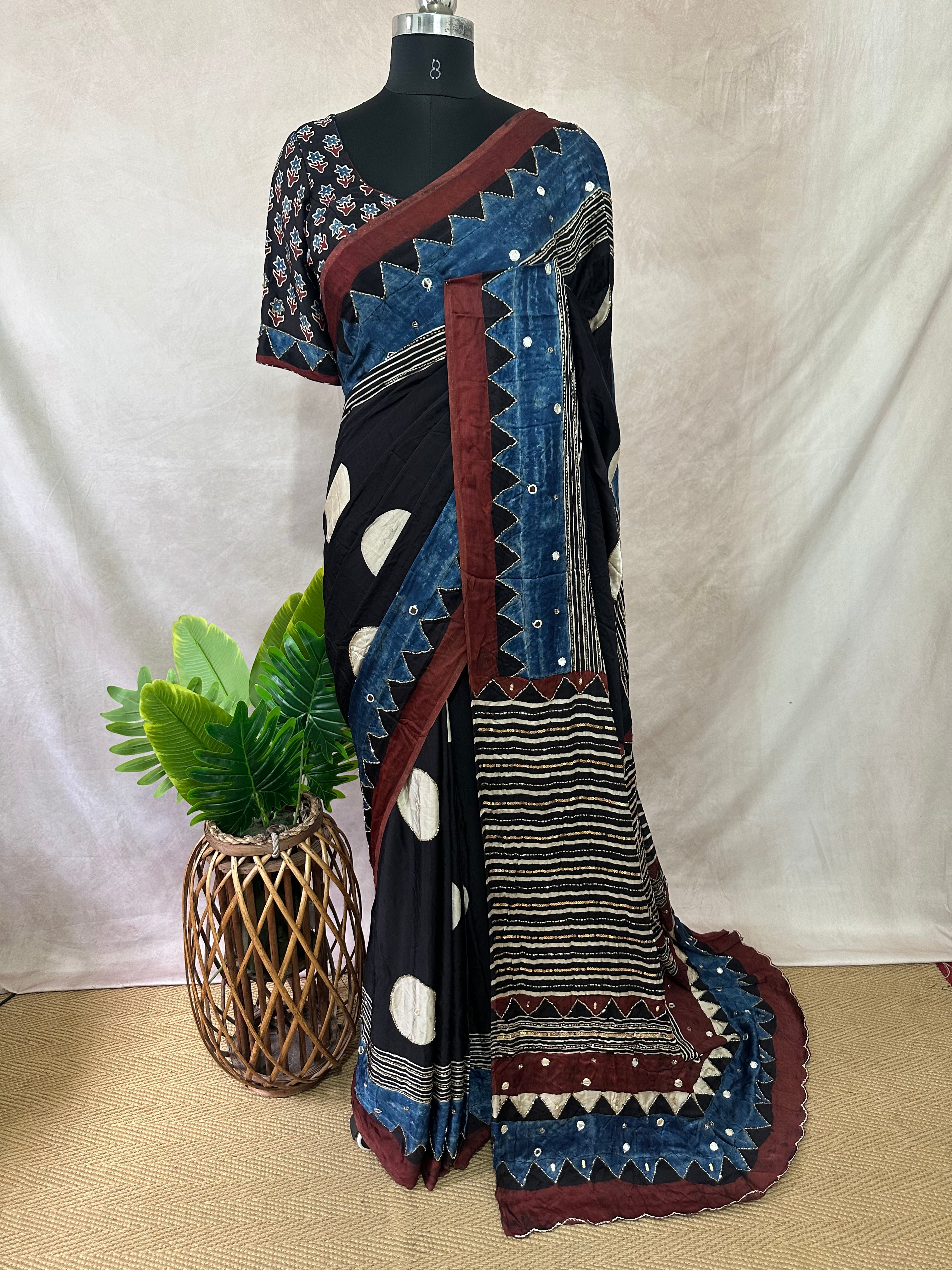 Modal silk saree with bead and mirror work , stitched blouse