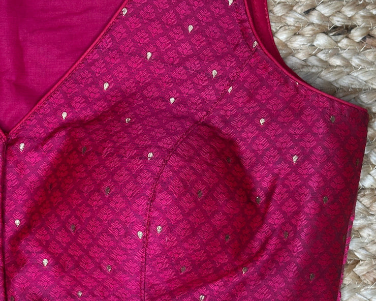Pink silk sleeveless blouse