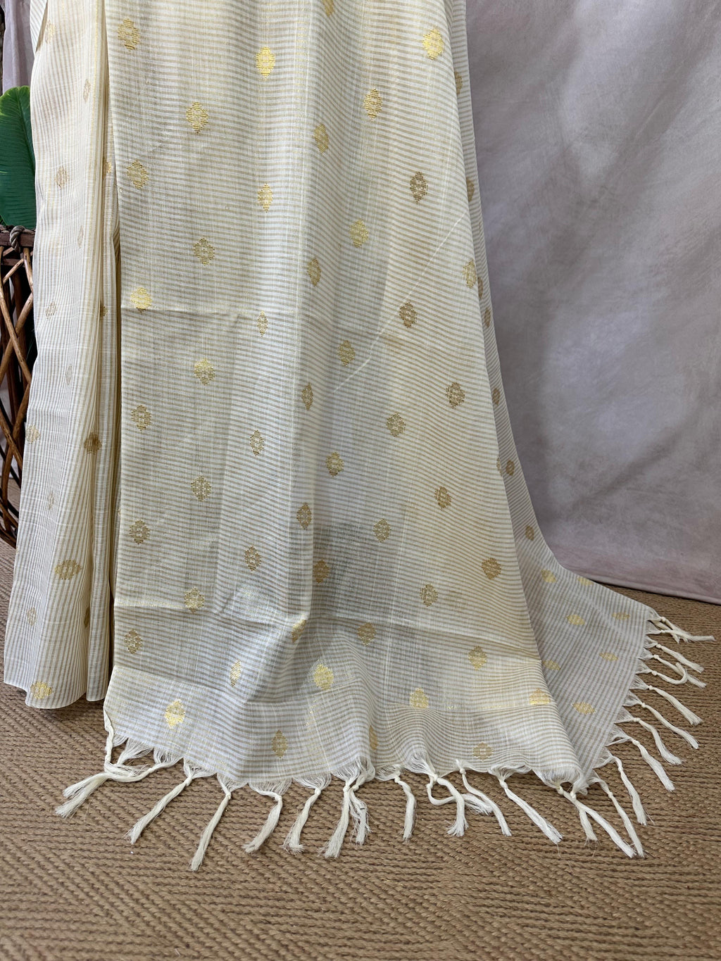 Off white soft tissue cotton saree with floral butta