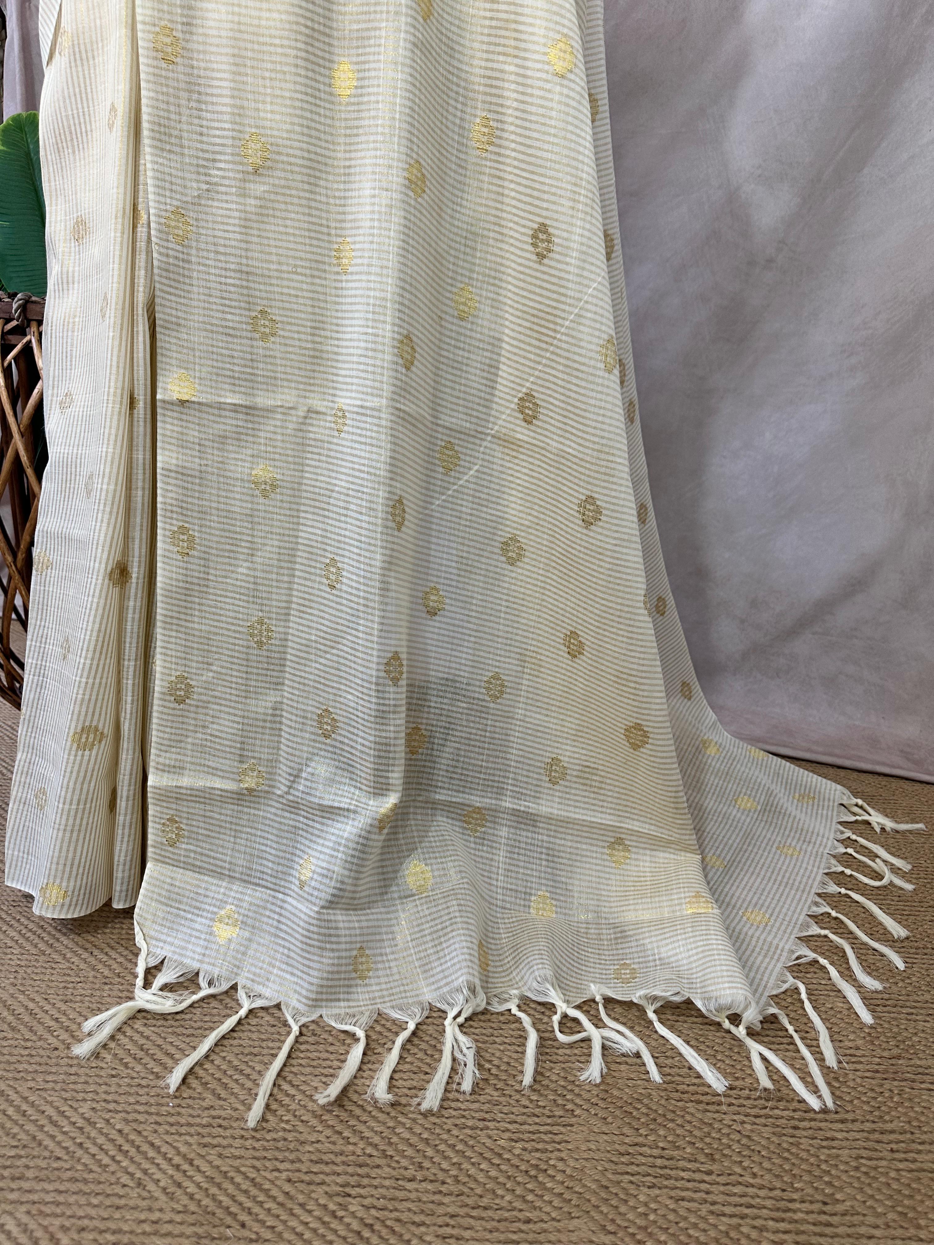 Off white soft tissue cotton saree with floral butta