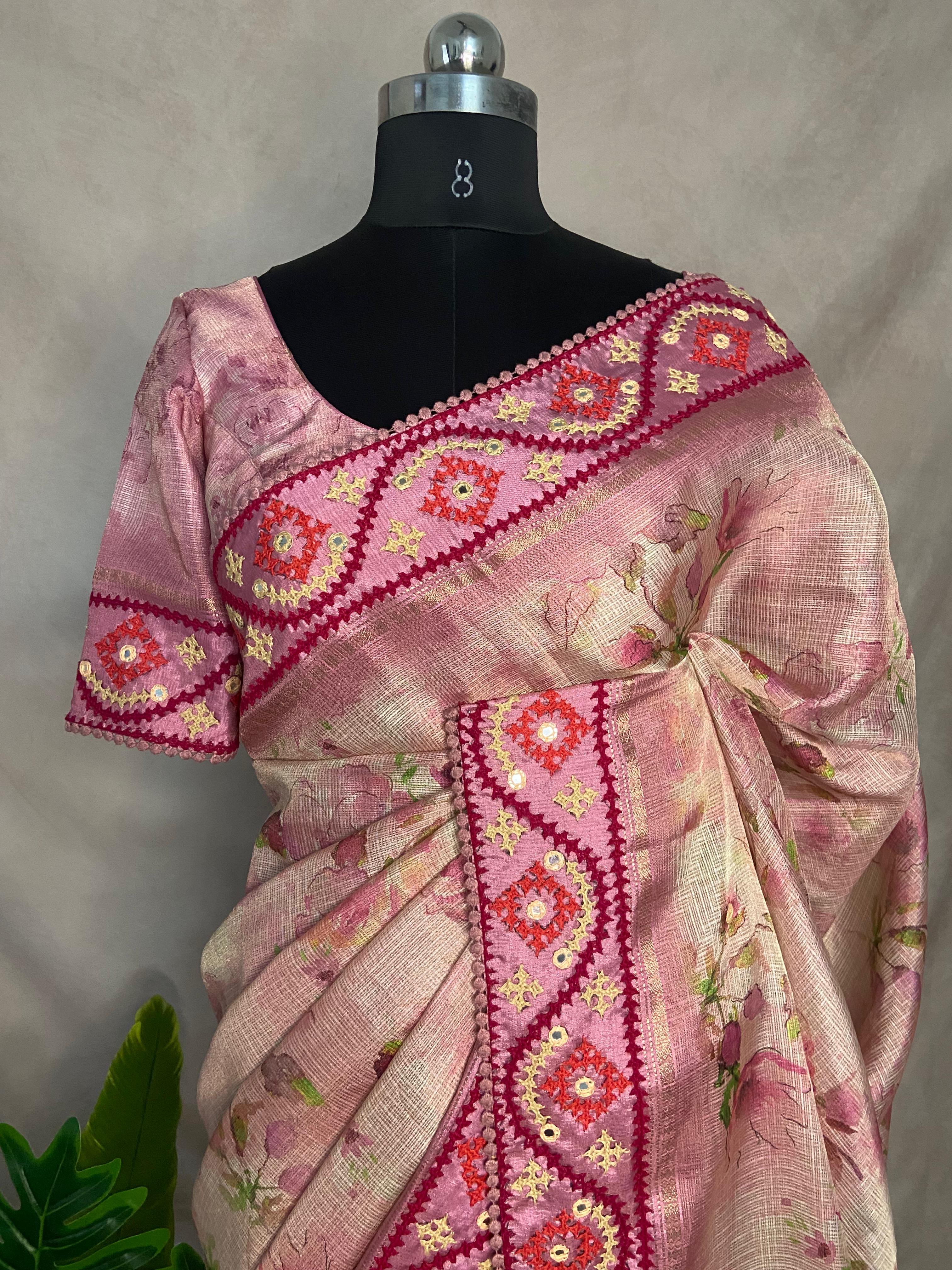 Tissue kotta saree with kutch work border and stitched blouse