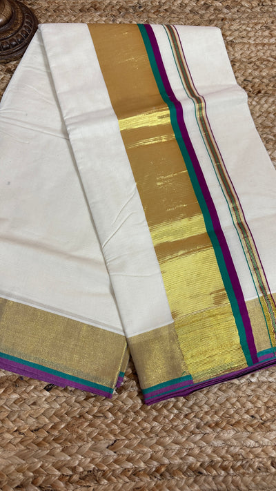 Set saree with copper sulfate blue , majenta and gold border