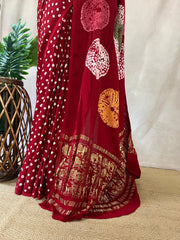 Red gajji silk saree with hand bandini and stitched blouse