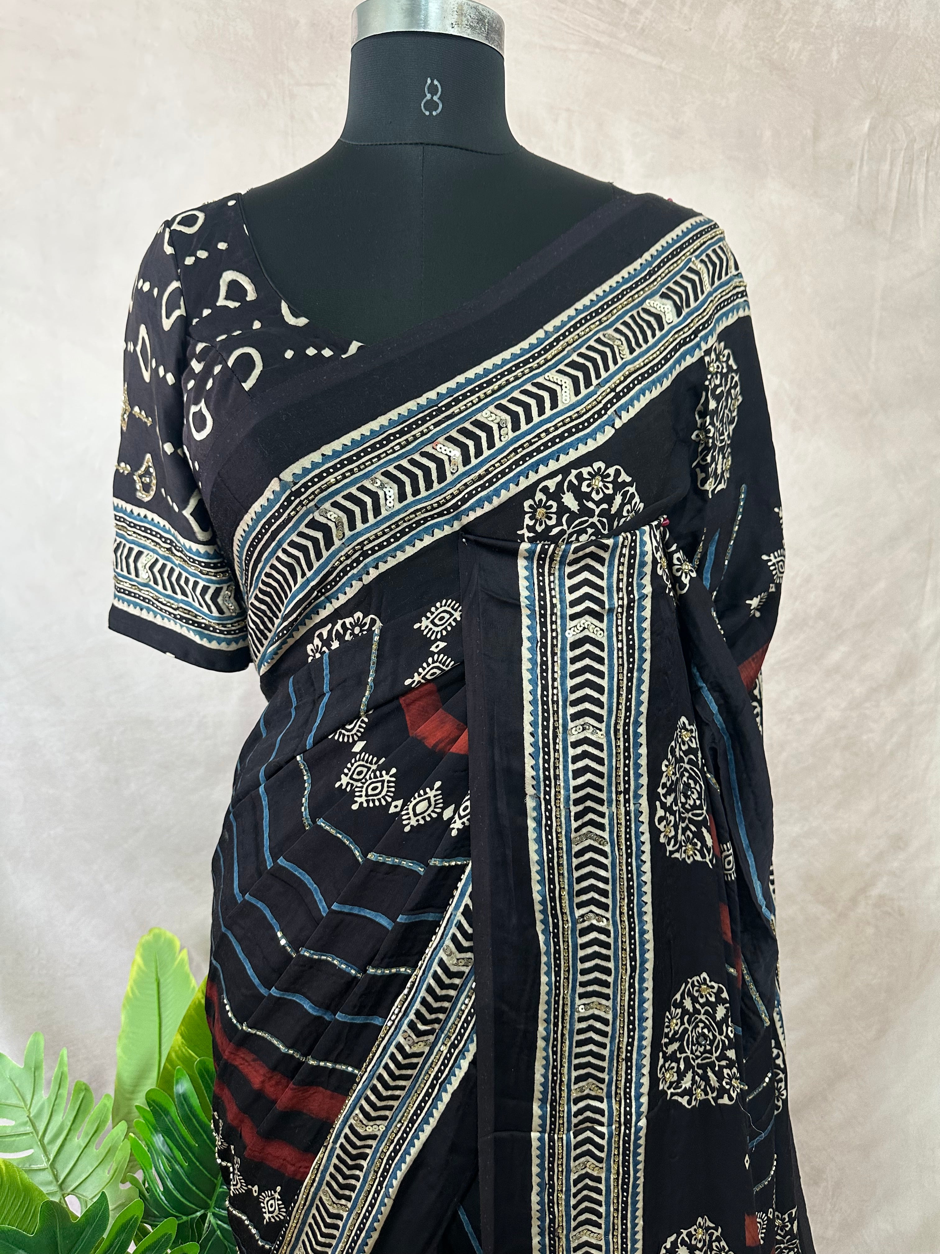 Modal silk saree with bead and mirror work , stitched blouse