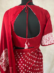 Red gajji silk saree with hand bandini and stitched blouse