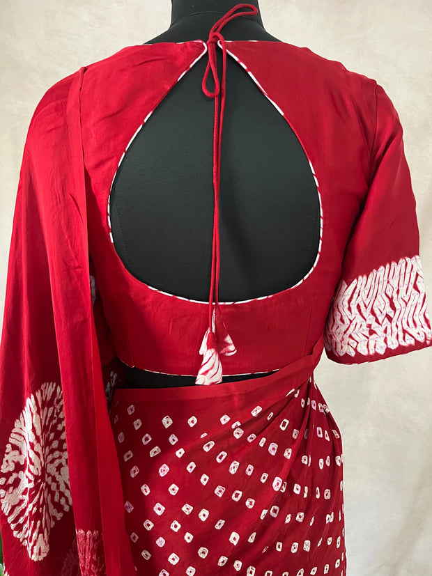Red gajji silk saree with hand bandini and stitched blouse