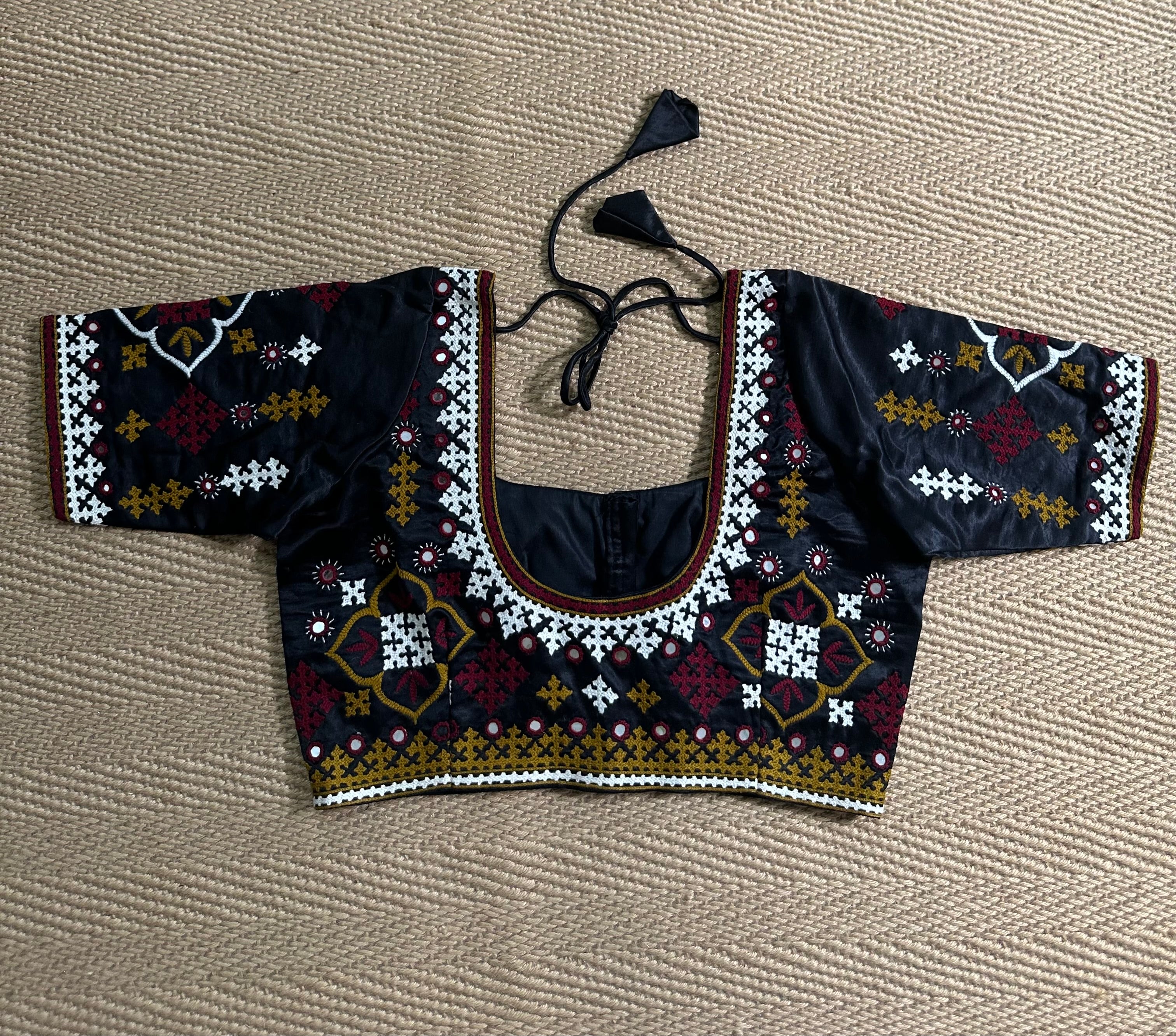 Black modal silk blouse with mirror work and hand Kutch Embroidery