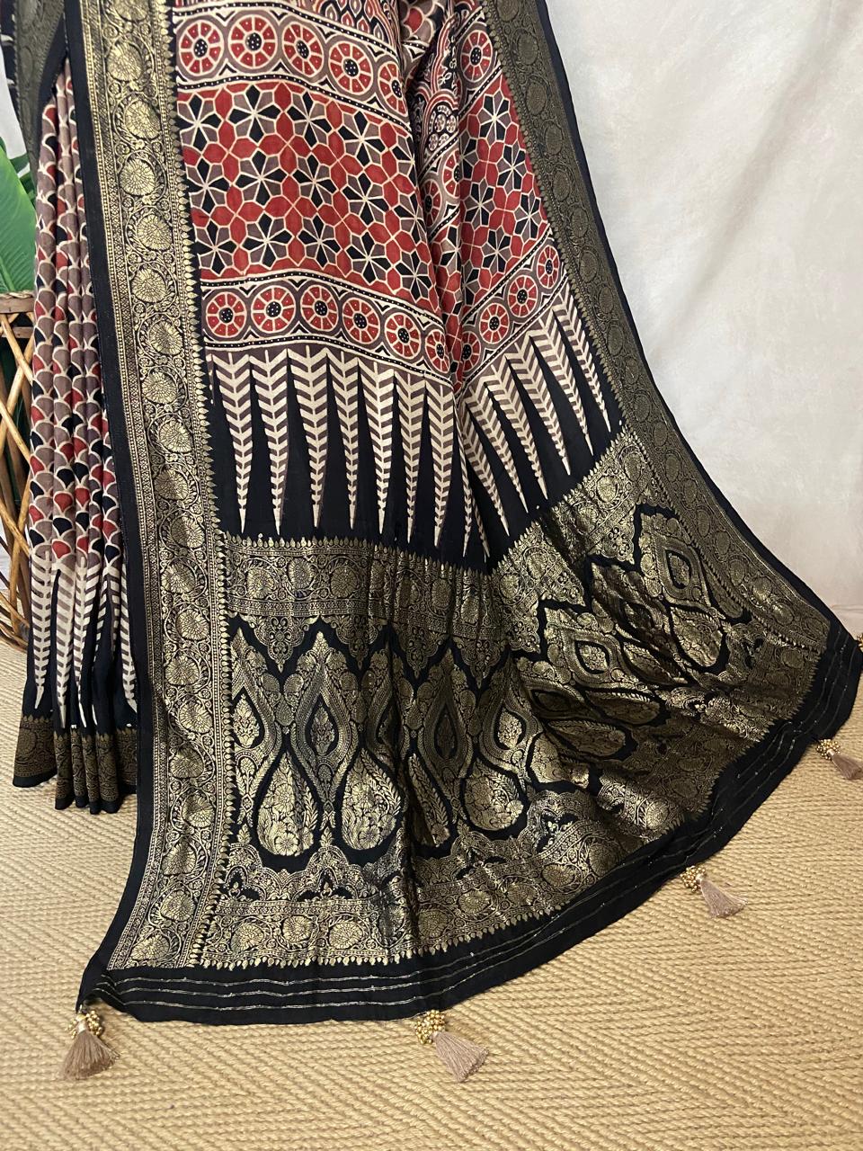 Ajrakh hand block printed premium dola silk saree with stitched blouse
